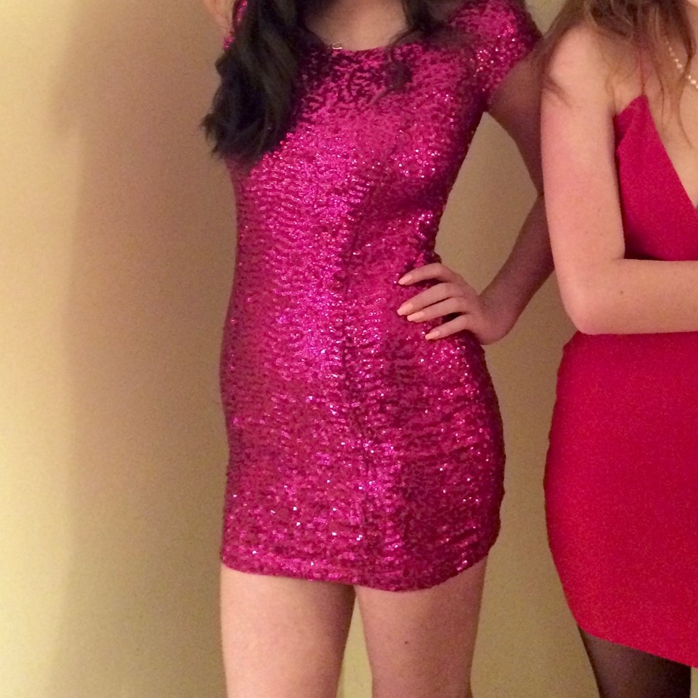Showstopper. Pink sequined mini dress.